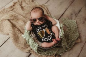 newborn session in Centralia, IL studio session, baby boy, talk to me goose, wrapped